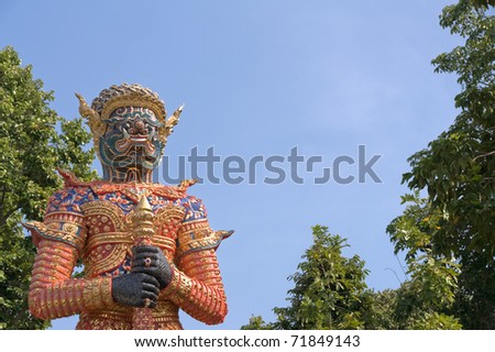 Giant demon statue standing, Thailand.