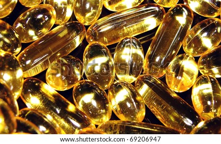 Omega Fish Oil. Health supplements in various capsule shapes & sizes