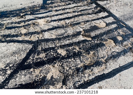 Road repair. Hole in the asphalt and bitumen