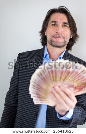 man with Russian money in his hands