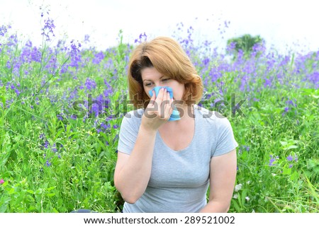 An adult woman with allergies on the Meadow