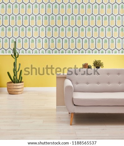 Similar – Image, Stock Photo Vintage sofa in moss green velvet with fringes stands on terracotta tiles. Coziness, old fashioned, past