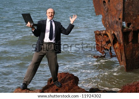 Image of an assessor or business man in trouble on the rocks in front of a ship wreck.