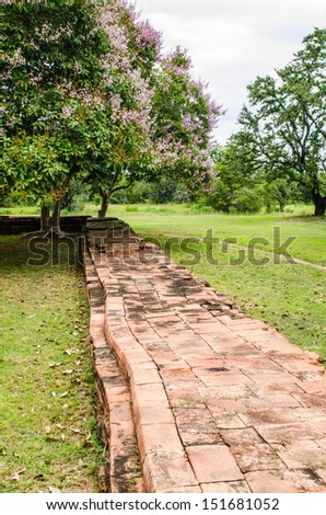 Red brick wall of ancient Prasat Non Ku castle, Thailand.