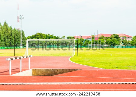 Running track, hurdle and goal in Thailand.