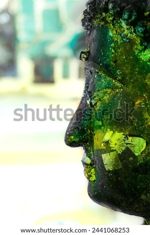 Similar – Image, Stock Photo Buddha face covered with tree roots