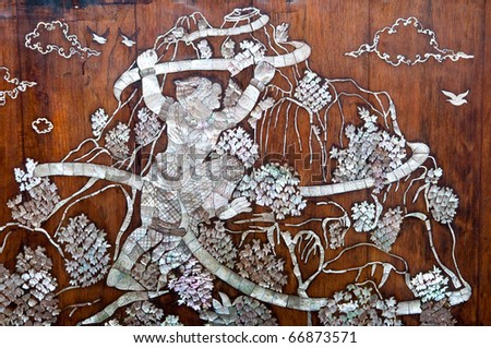 Thai style art on wall made from pearl shell, Thailand.