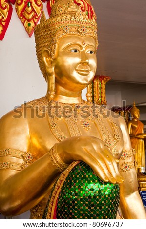 Golden god statue at the temple, Thailand.