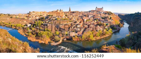 Panoramic view of the historic city of Toledo with river Tajo at sunset in Castile-La Mancha, Spain