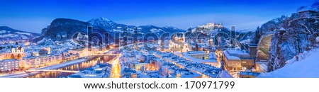 Panoramic view of the historic city of Salzburg with Festung Hohensalzburg and river Salzach in winter, Salzburger Land, Austria