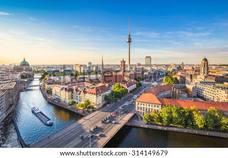 Similar – Image, Stock Photo Summer in Berlin. The stand-up paddlers on the Spree have the goal Oberbaumbrücke clearly in sight. From afar, the television tower of Alexanderplatz greets them.