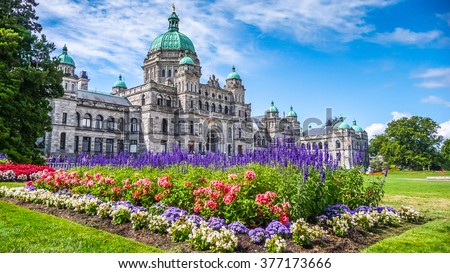 Beautiful view of historic parliament building in the citycenter of Victoria with colorful flowers on a sunny day, Vancouver Island, British Columbia, Canada ストックフォト © 