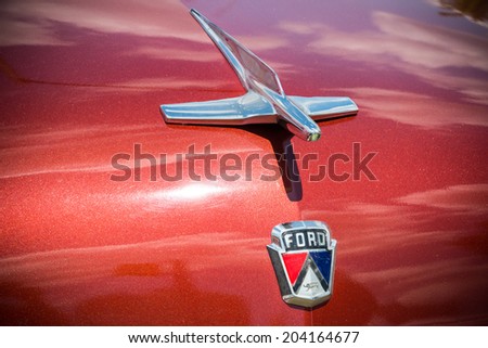 MISSISSAUGA, CANADA - JULY 6 2014: Ford Customline Emblem and Hood Ornament. As seen at \