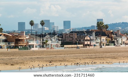 Newport Beach California 3. The coastline of Newport Beach, California on a hazy sunny morning with the Irvine city skyline in the distance.