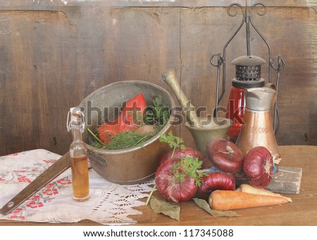 vegetables in a copper bowl and  russian embroidered  towel