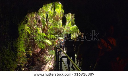VOLCANOES NATIONAL PARK, HAWAII - JULY 21: Tourists enter the Thurston Lava Tube in Volcanoes National Park, Hawaii on July 21, 2015.