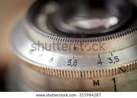 Vintage camera lens close up. Selective focus. Shallow depth of field.