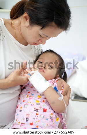 Mom is take care her baby