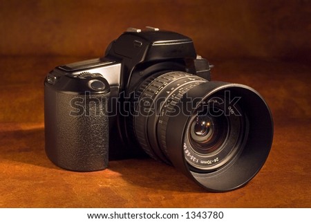 A 35mm SLR camera with standard zoom lens