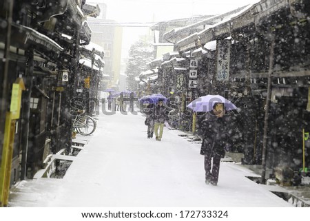 TAKAYAMA,JAPAN-JANUARY19:Takayama in the snow a city which retains a traditional touch like few other Japanese ,especially in it beautifully preserved old town on JANUARY19,2014 in Takayama,Japan.