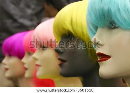 faces of  mannequins with different hair and skin-colors