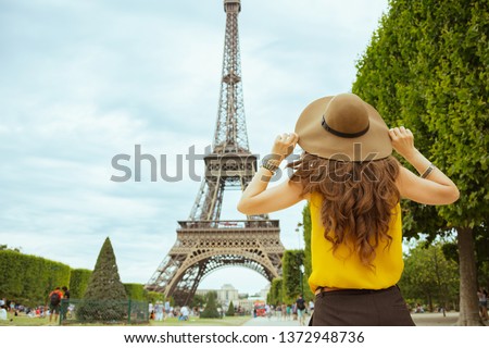 Similar – Image, Stock Photo Anonymous traveling woman on rocky seashore