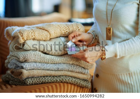 Similar – Image, Stock Photo Cheerful female near triangle window