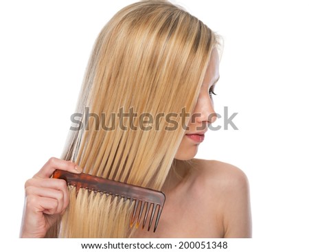 Young Woman Combing Hair Stock Photo 200051348 : Shutterstock