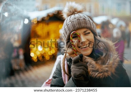 Similar – Foto Bild Frau auf Weihnachtsmarkt