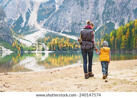 Similar – Image, Stock Photo Anonymous woman on mountain enjoying nature