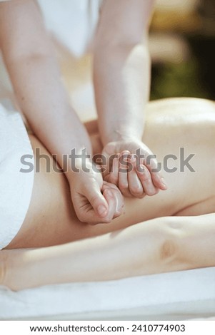 Similar – Image, Stock Photo Therapist doing loin massage for patient in clinic