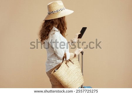 Similar – Image, Stock Photo Anonymous female with luggage walking in empty airport