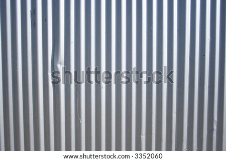 corrugated metal panel with vertical ridges background
