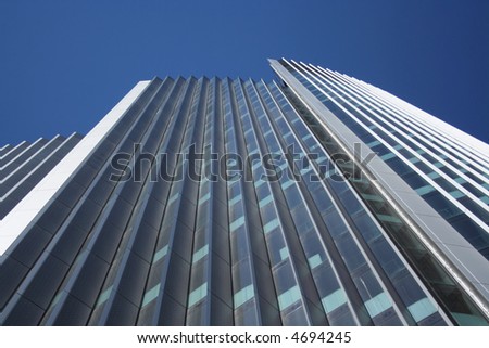 looking up at tall skyscraper