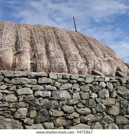 old buildings with thatched roof Blackhouse village Isle of Lewis Scotland