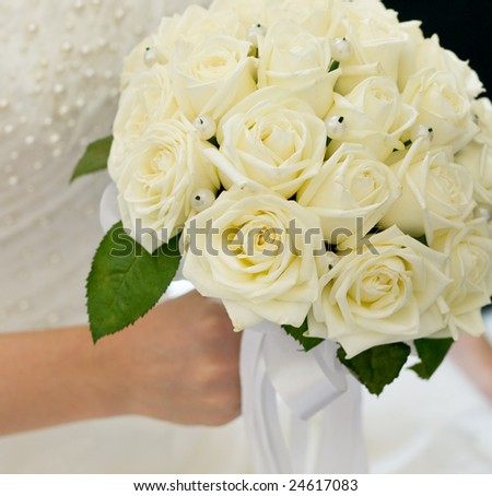 Close-up of wedding bouquet at bride\'s hands