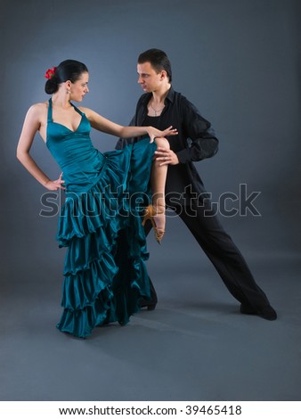 passion flamenco dancers over grey background
