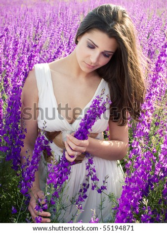 young sensual girl in violet field