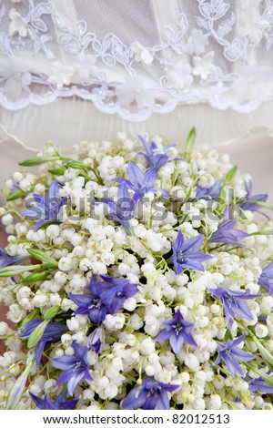 closeup shot of wedding bouquet made from lily of the valley