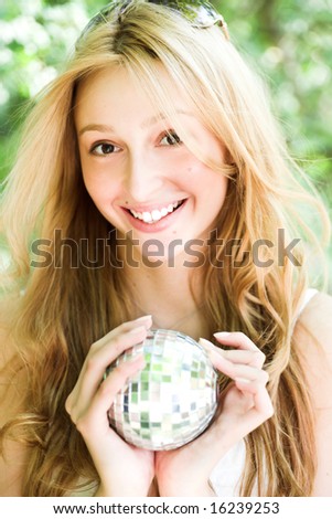 Smiling girl with magic ball