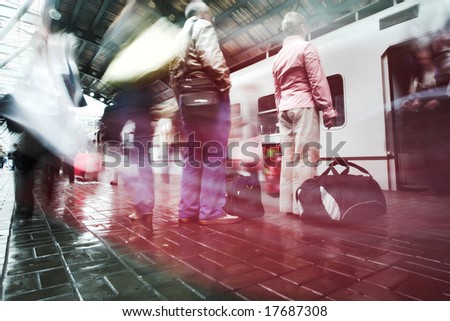train on platform in subway and people crowd
