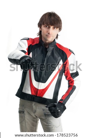 Handsome man in biker jacket and gloves isolated on white background