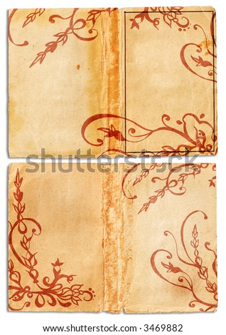 Grunge open books with stained and folded pages, swirls and scrolls. Clipping path included.