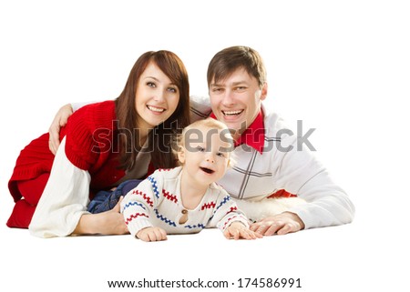 happy family three persons, smiling father mother and laughing baby lying over white background