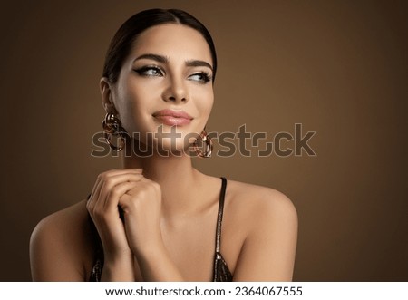 Similar – Image, Stock Photo Elegant earring in the glass with roses and rose petals