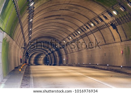 Similar – Image, Stock Photo Highway tunnel. Interior of urban tunnel without traffic in nught with blue lights. Rome, Italy