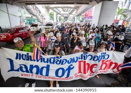 BANGKOK,THAILAND- JUNE 30 : Unidentified protesters, V for Thailand group, wear Guy Fawkes masks to protest government corruption on June 30,2013 in Bangkok,Thailand.