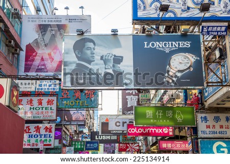 HONG KONG , CHINA - AUG 10 : Mongkok  on August 10, 2014 in Hong Kong, China. Mongkok in Kowloon is one of the most neon-lighted place in the world and is full of ads of different companies.