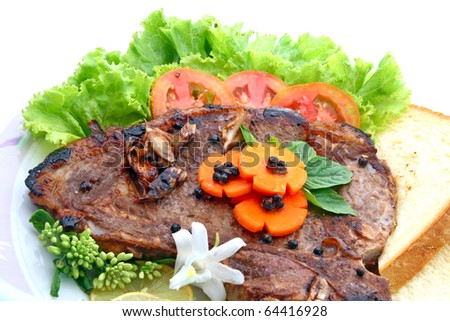 T Bone Pepper Steak with vegetable isolated on white