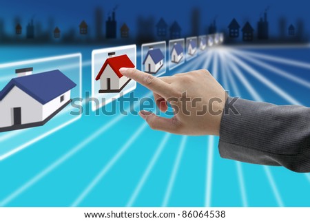 man hand Finding new property in real estate market with electronic commerce concept
